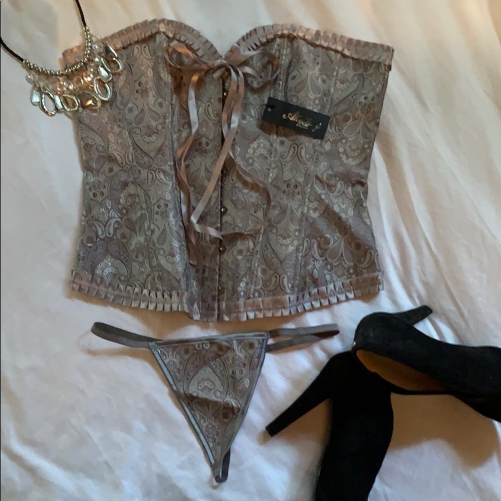 Silver corset.